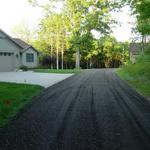 Gravel Paved Driveway in Rockford.  Customer was concerned about the border between the driveway and the lawn.  Once complete, they were very happy with the clean straight lines we were able to create.