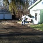 Andy pointing out his new crushed asphalt/crushed blacktop driveway.  Congratulations Andy and Melanie, enjoy your new driveway, it was a pleasure working with you!  www.gravelgraders.com